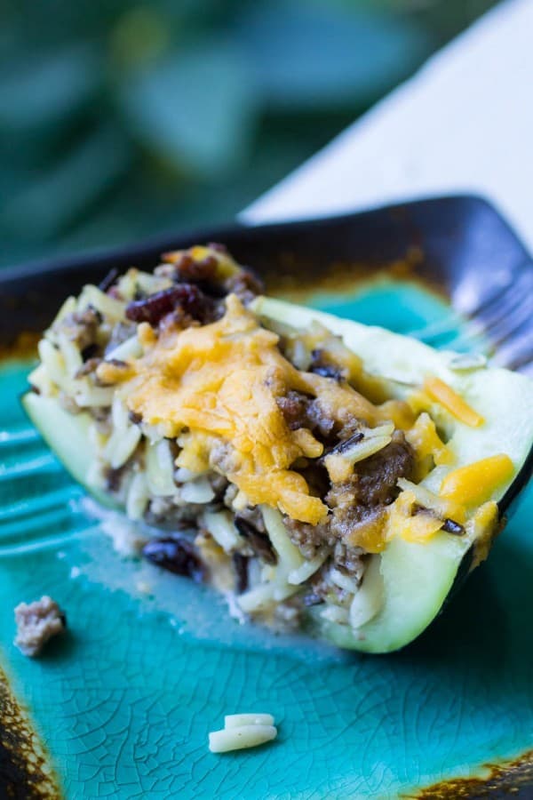 Flavorful and unique stuffed zucchini dinner filled with orzo, wild rice, and beef.